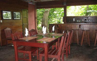 Open-air restaurant at Mombacho Lodge with tropical forest view